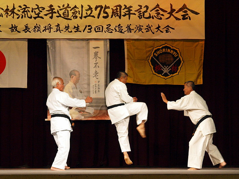 Senseis Taira, Arakaki and Higa demonstrating bunkai to Kusanku